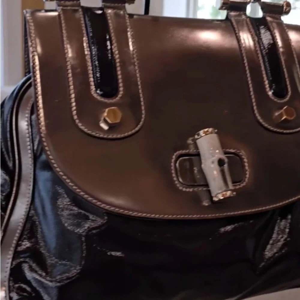 Gucci Black and Gold Satchel with Classic Design